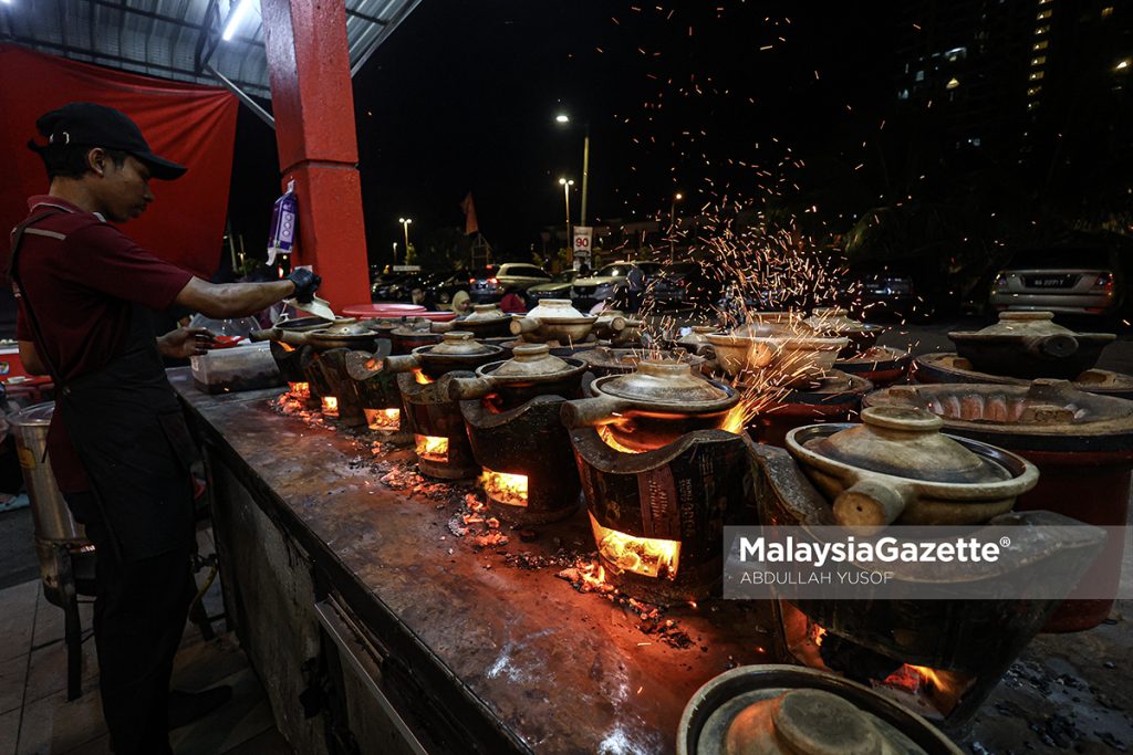 Nasi ayam claypot dapur arang menu ikonik restoran Oppa Zuzu