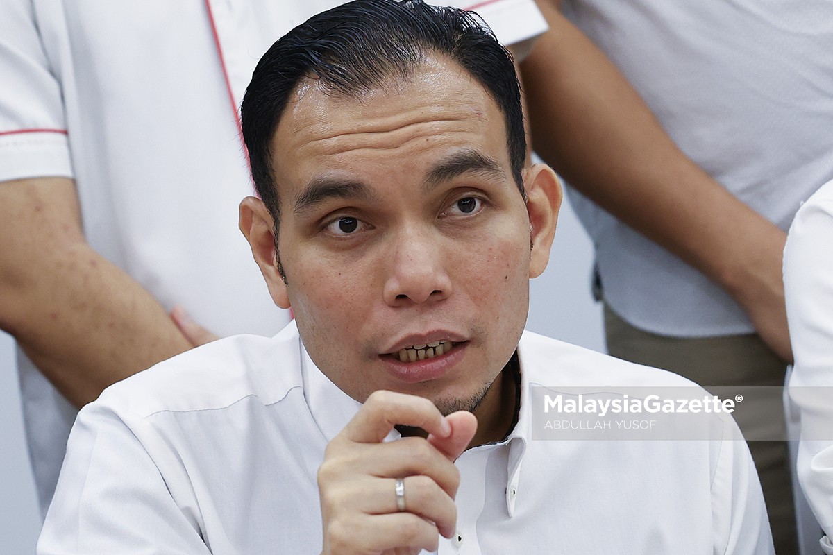 Woo Kah Leong disiasat karikatur Razman karikatur Razman Zakaria, Woo Kah Leong DAPSY, siasatan polis ADUN Pasir Bedamar, isu kebebasan bersuara Malaysia, politik sindiran DUN Perak
