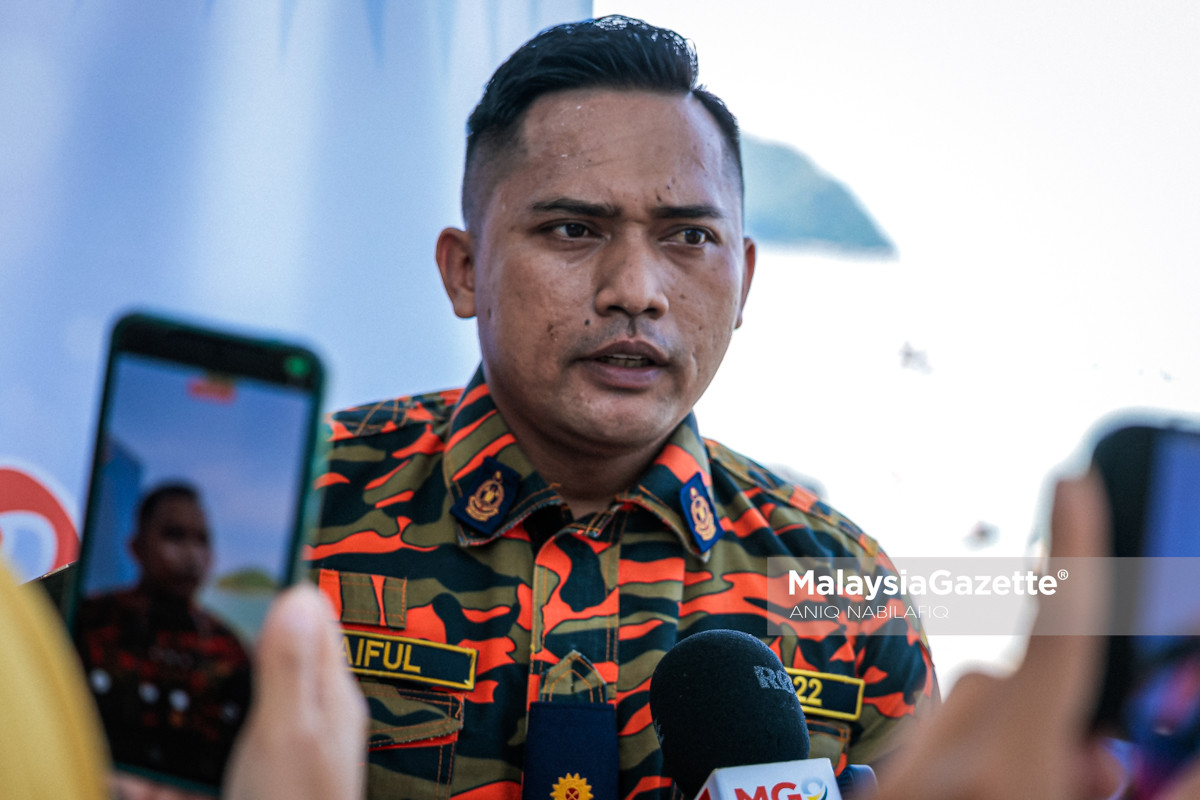 fenomena laut terbelah Pulau Pangkor fenomena air laut surut Pulau Pangkor, laut terbelah Teluk Nipah, Pulau Giam Pangkor, tarikan pelancongan Perak, cuti perayaan Pulau Pangkor, Pantai Teluk Nipah